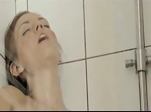 Darkhair masturbation in a bathroom